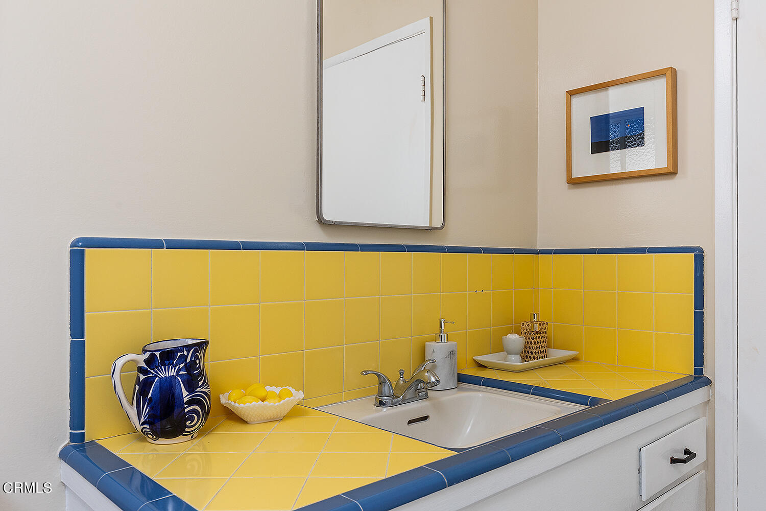 4176 Canyon Crest Road Altadena, CA 91001 - Photo 19 of 33 a bathroom with a sink and a mirror