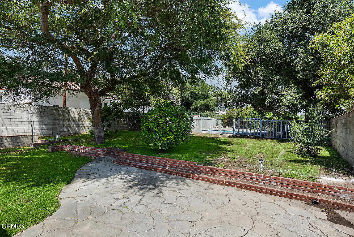 4176 Canyon Crest Road Altadena, CA 91001 - Photo 25 of 33 a view of a garden with a tree
