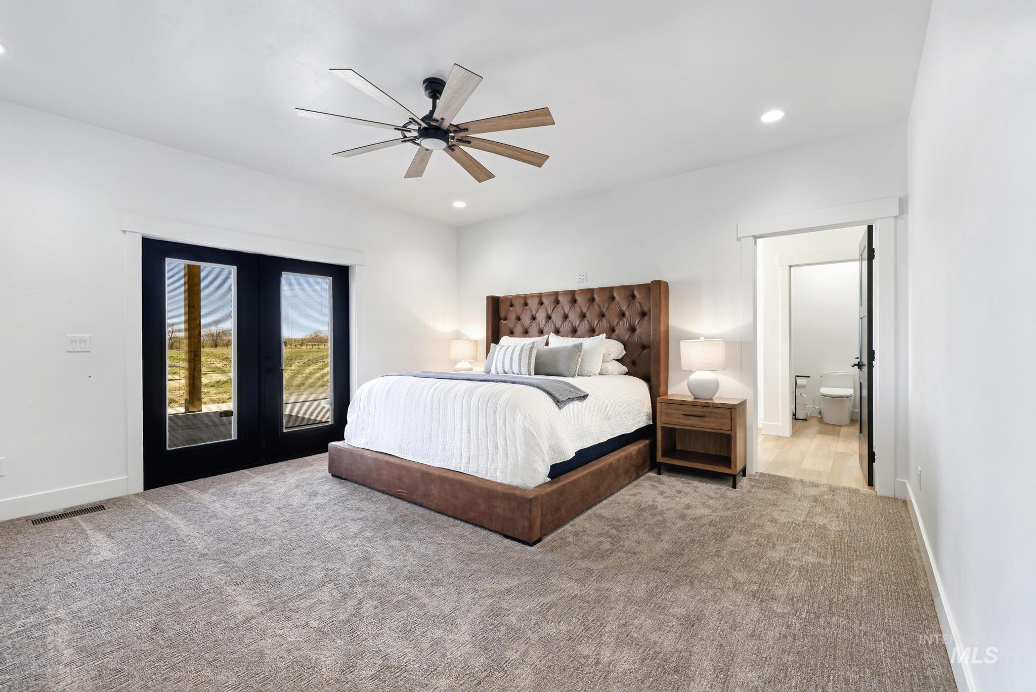 4288 North 2400 East Filer, ID 83328 - Photo 21 of 50 Carpeted bedroom featuring access to outside, recessed lighting, ceiling fan, and french doors