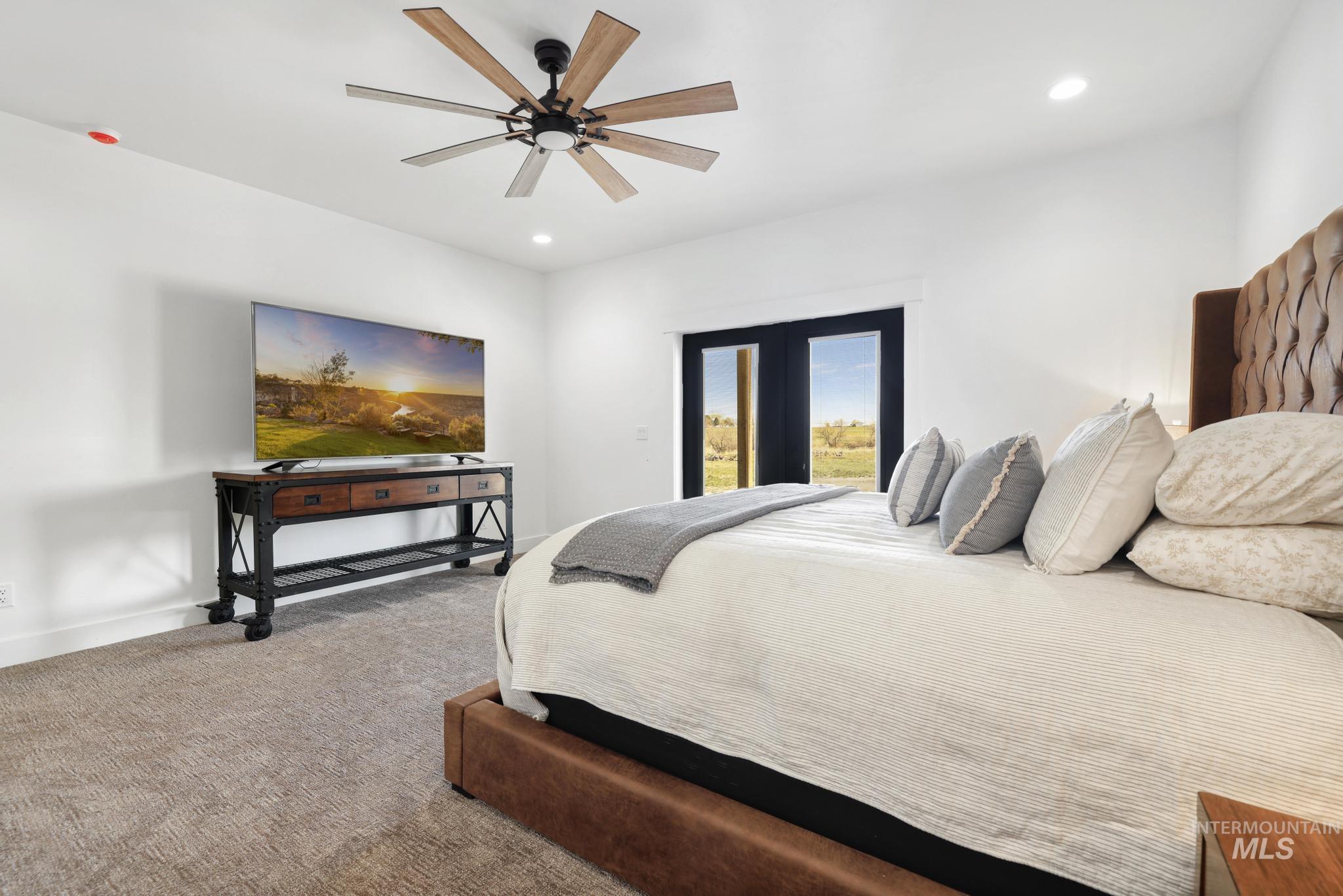 4288 North 2400 East Filer, ID 83328 - Photo 23 of 50 Bedroom featuring carpet, a ceiling fan, recessed lighting, and access to outside