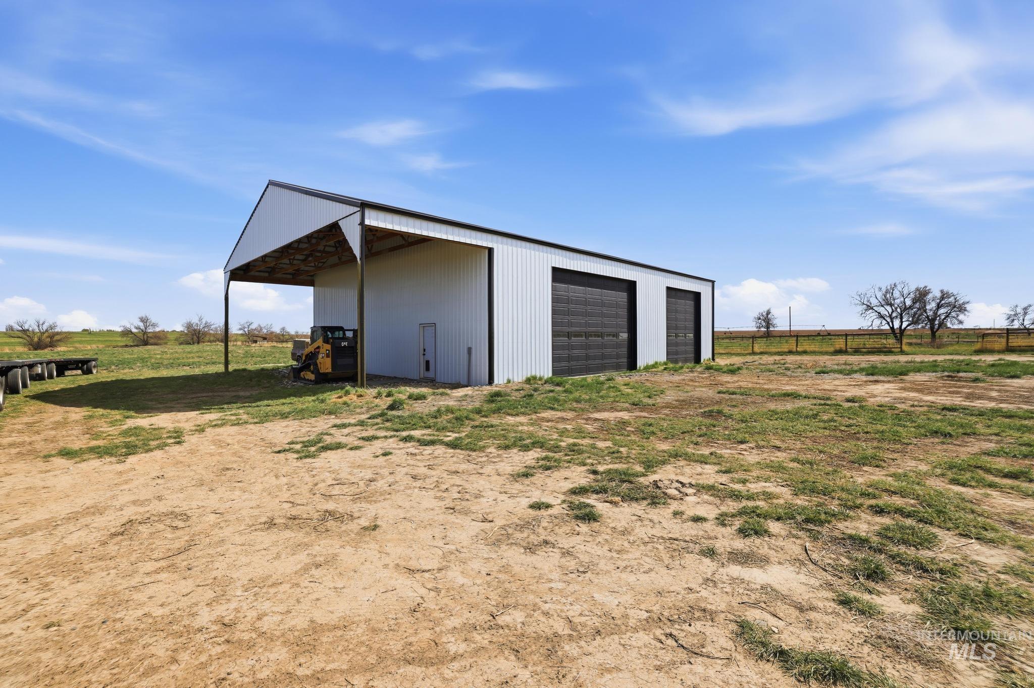 4288 North 2400 East Filer, ID 83328 - Photo 3 of 50 View of outdoor structure with a view of rural / pastoral area