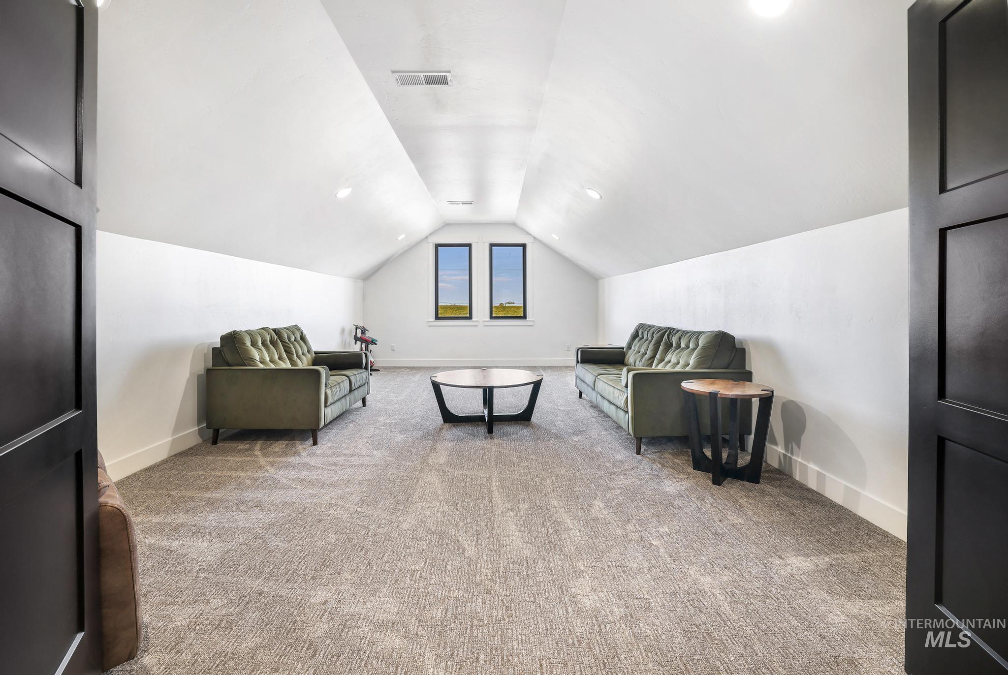 4288 North 2400 East Filer, ID 83328 - Photo 42 of 50 Living area featuring carpet floors and baseboards