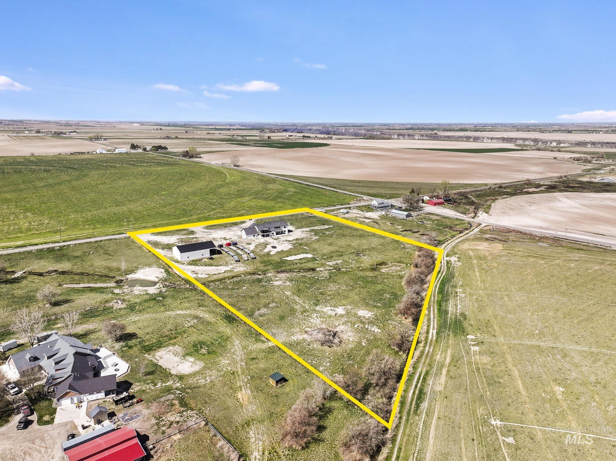 4288 North 2400 East Filer, ID 83328 - Photo 48 of 50 View of rural area with property parcel outlined and rows of crops