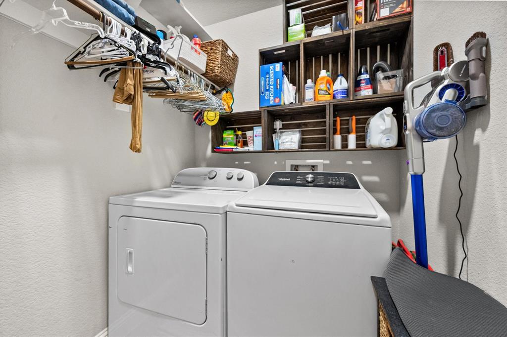 6365 Rhoden Avenue Godley, TX 76044 - Photo 24 of 31 a utility room with dryer and washer