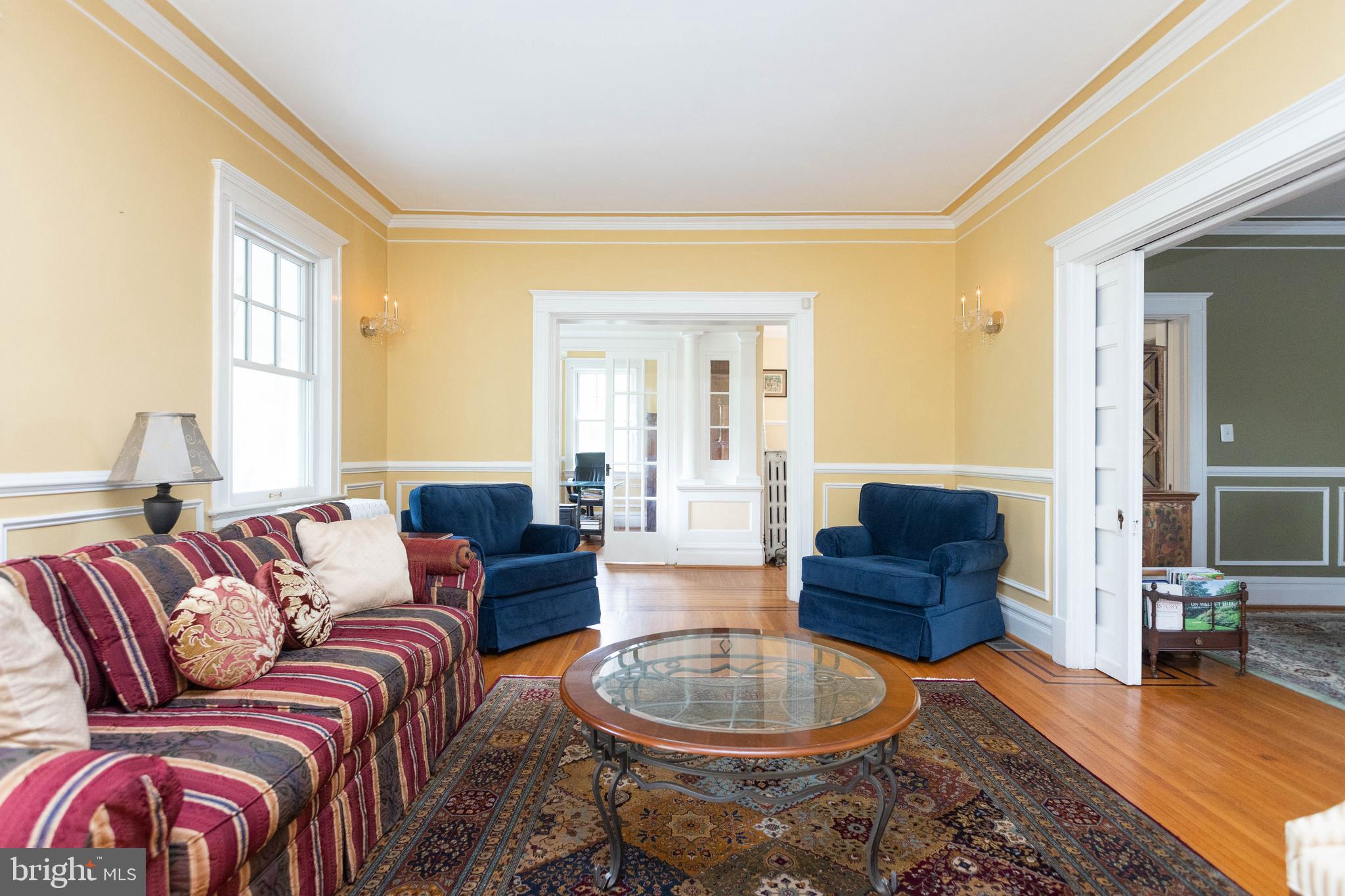 4511 Roland Avenue Baltimore, MD 21210 - Photo 8 of 64 Living room with pocket doors