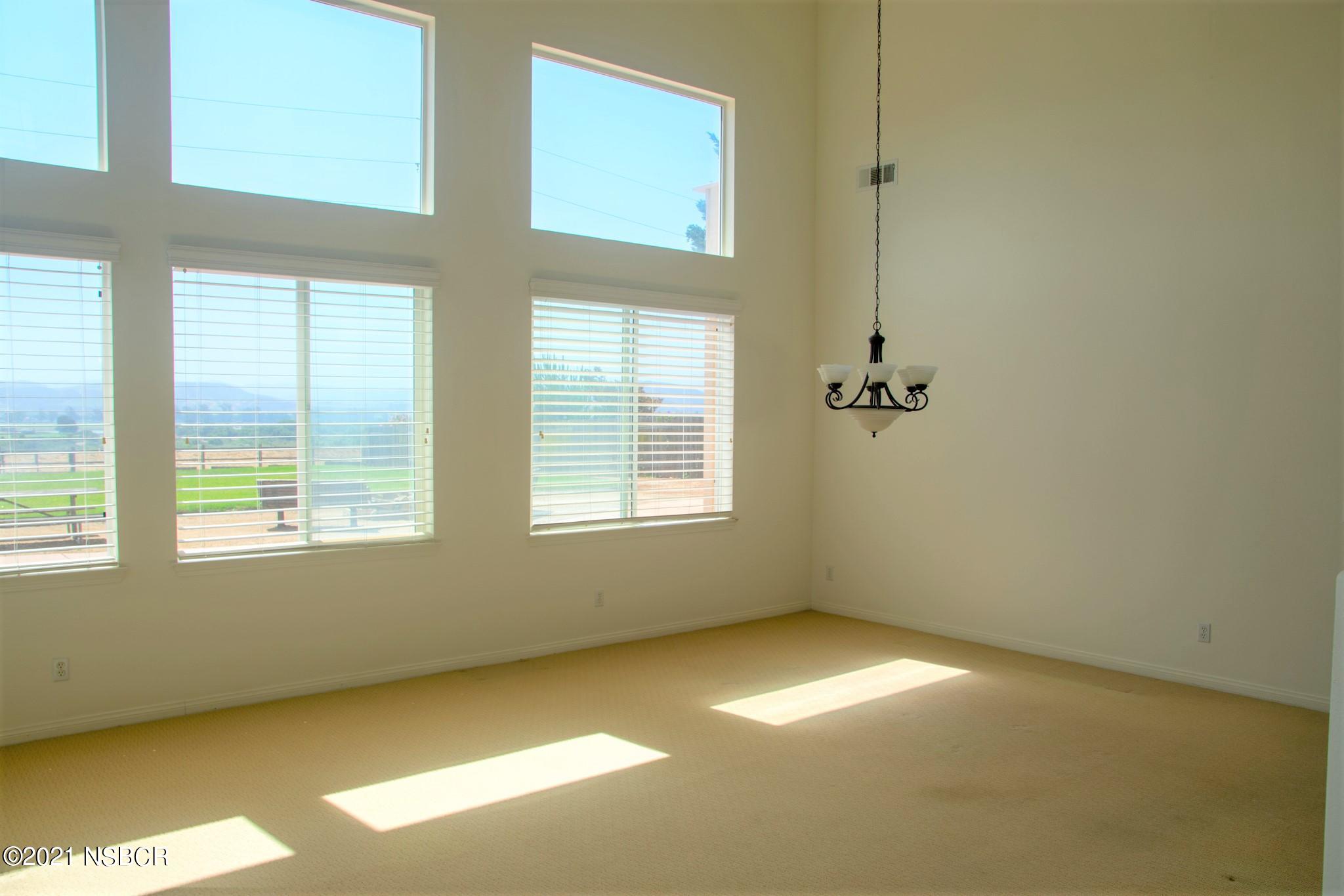 352 Ladera Lompoc, CA 93436 - Photo 6 of 35 a view of an empty room with a window