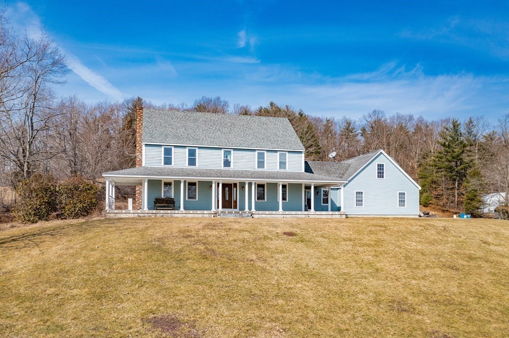 297 Brookfield Road Brimfield, MA 01010 - Photo 6 of 42 a view of a house with a yard
