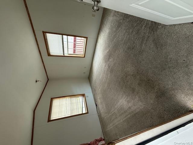 701 Sawkill Road, Unit 10 Kingston, NY 12401 - Photo 3 of 8 an empty room with windows