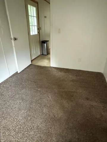 a house with trees in the background