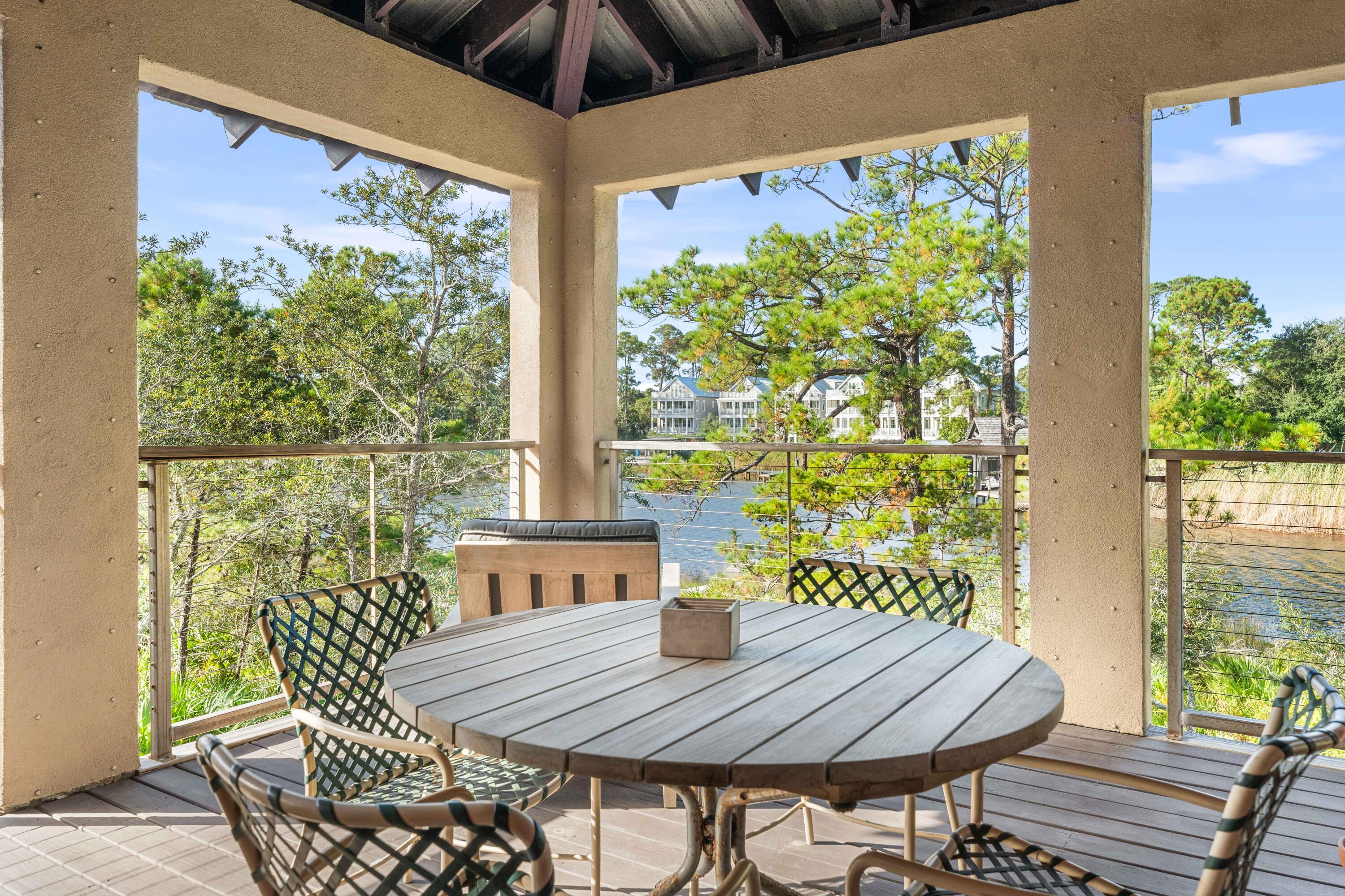 267 Wilderness Way Santa Rosa Beach, FL 32459 - Photo 20 of 71 a outdoor dining space with furniture and outdoor view