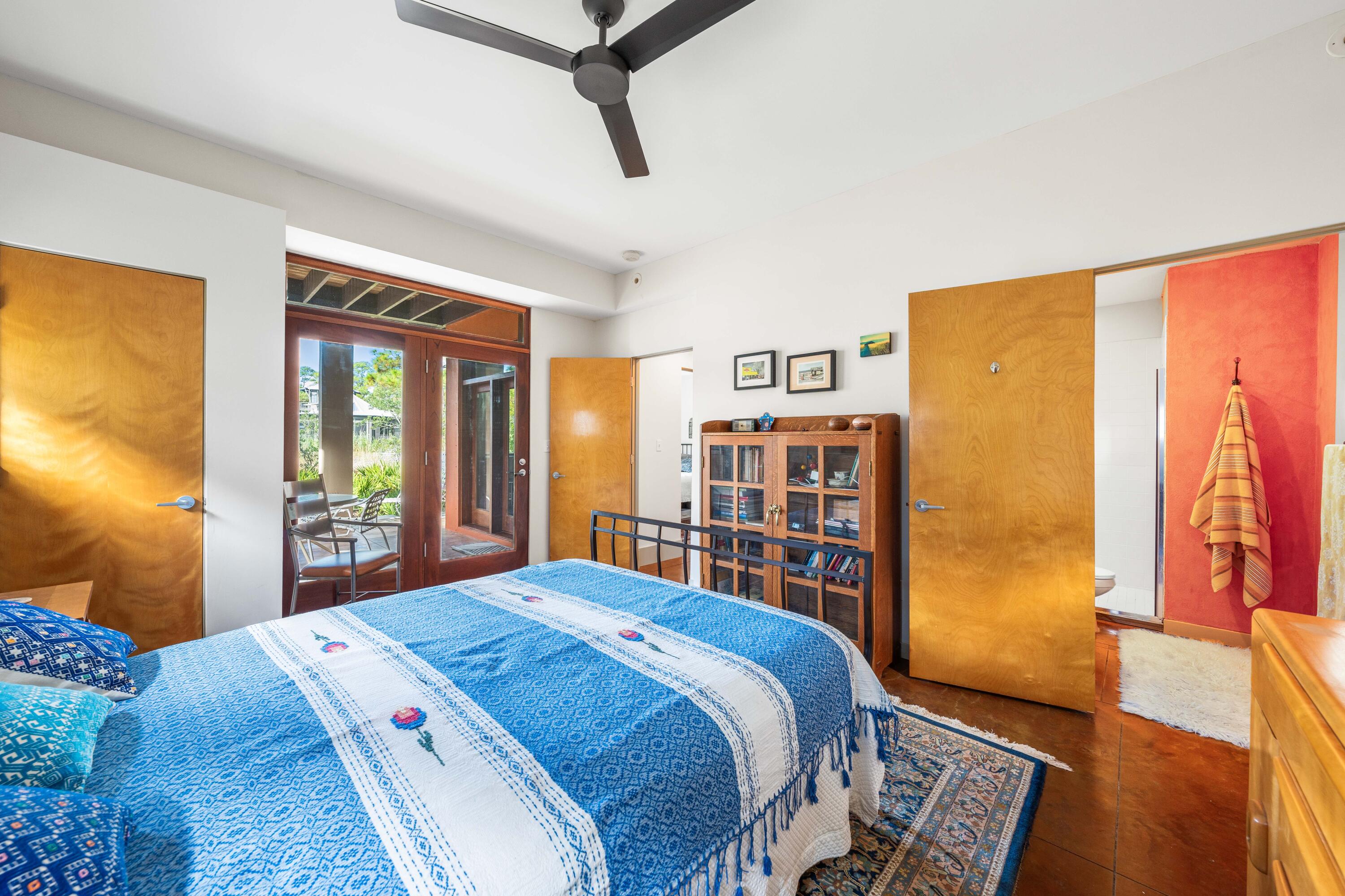 267 Wilderness Way Santa Rosa Beach, FL 32459 - Photo 50 of 71 a bedroom with a bed and wooden floor