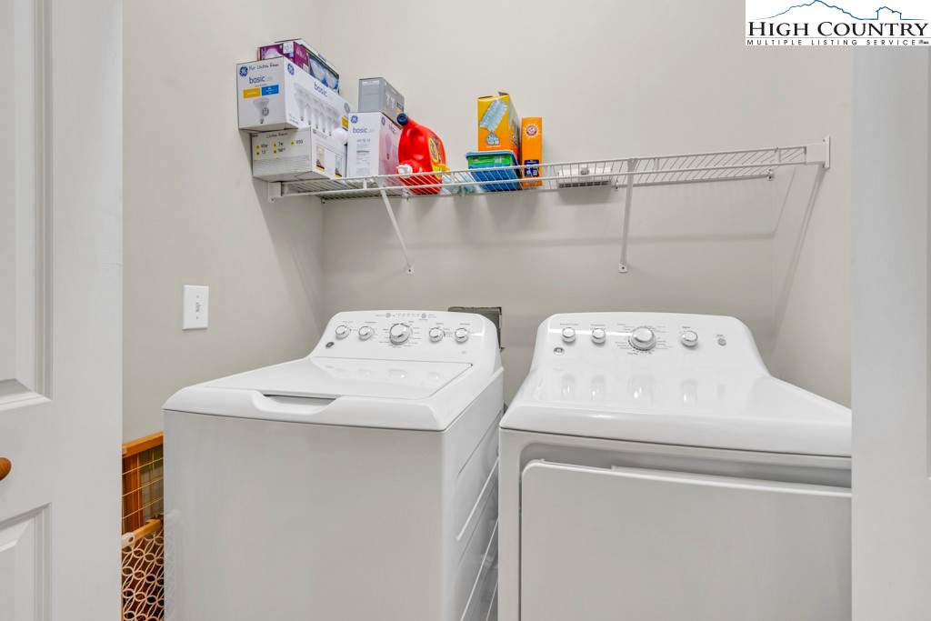 100 Northridge Road Beech Mountain, NC 28604 - Photo 25 of 32 a utility room with dryer and washer