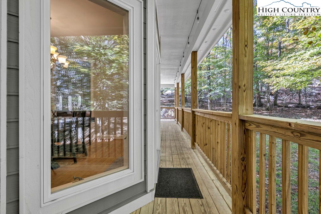 100 Northridge Road Beech Mountain, NC 28604 - Photo 28 of 32 a view of a glass door and the balcony