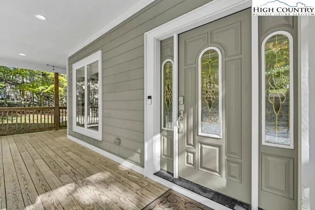 a front view of a house with a porch