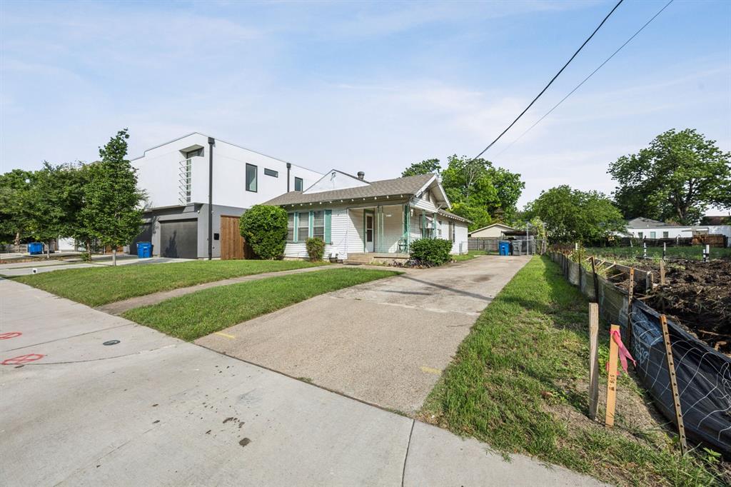 4611 Rusk Avenue Dallas, TX 75204 - Photo 1 of 1 View of front of home featuring driveway
