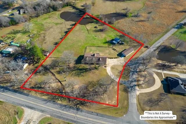 a house with trees in the background