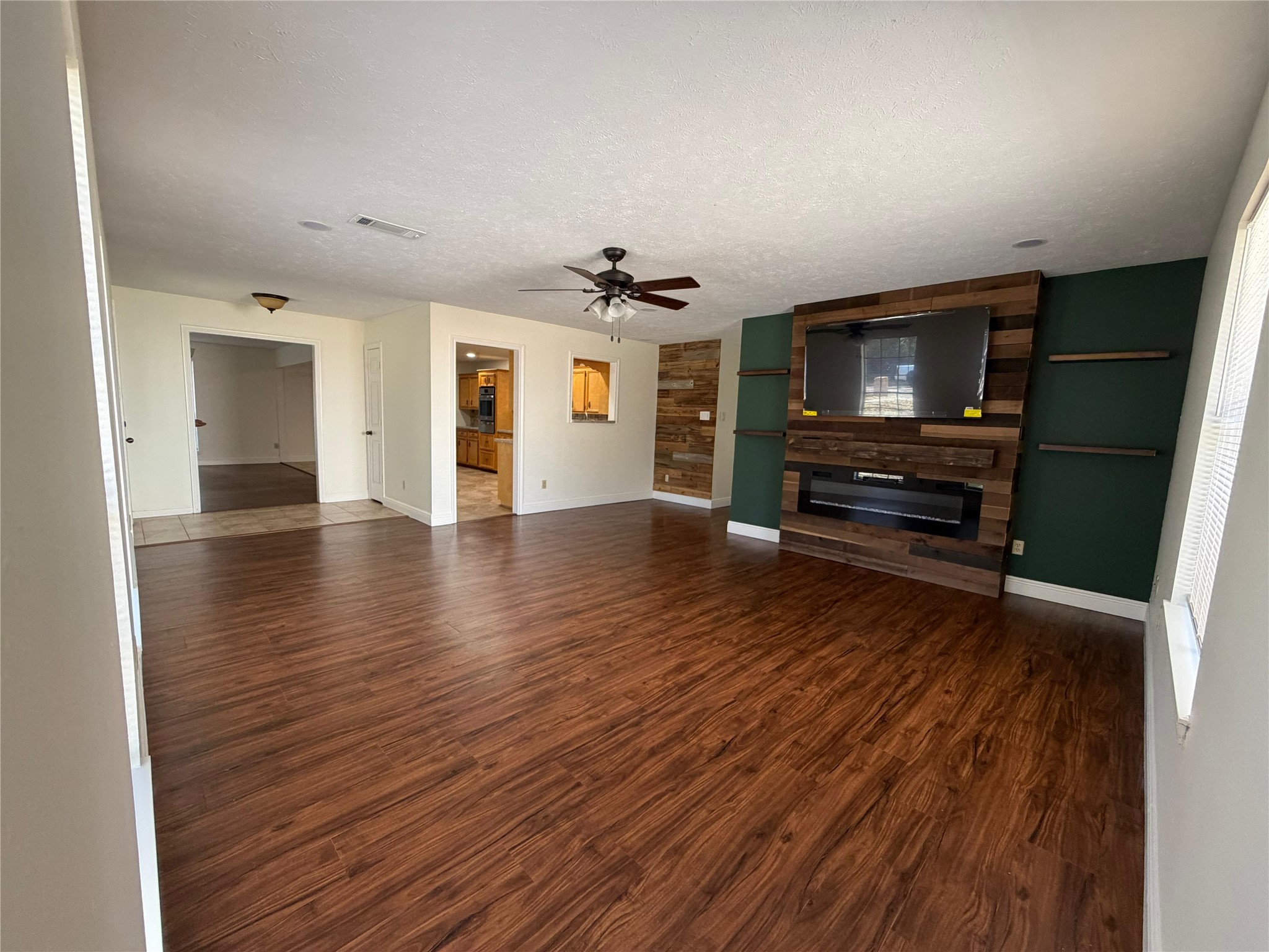 7818 King Arthur Court Spring, TX 77379 - Photo 18 of 29 a view of living room with furniture and a flat screen tv