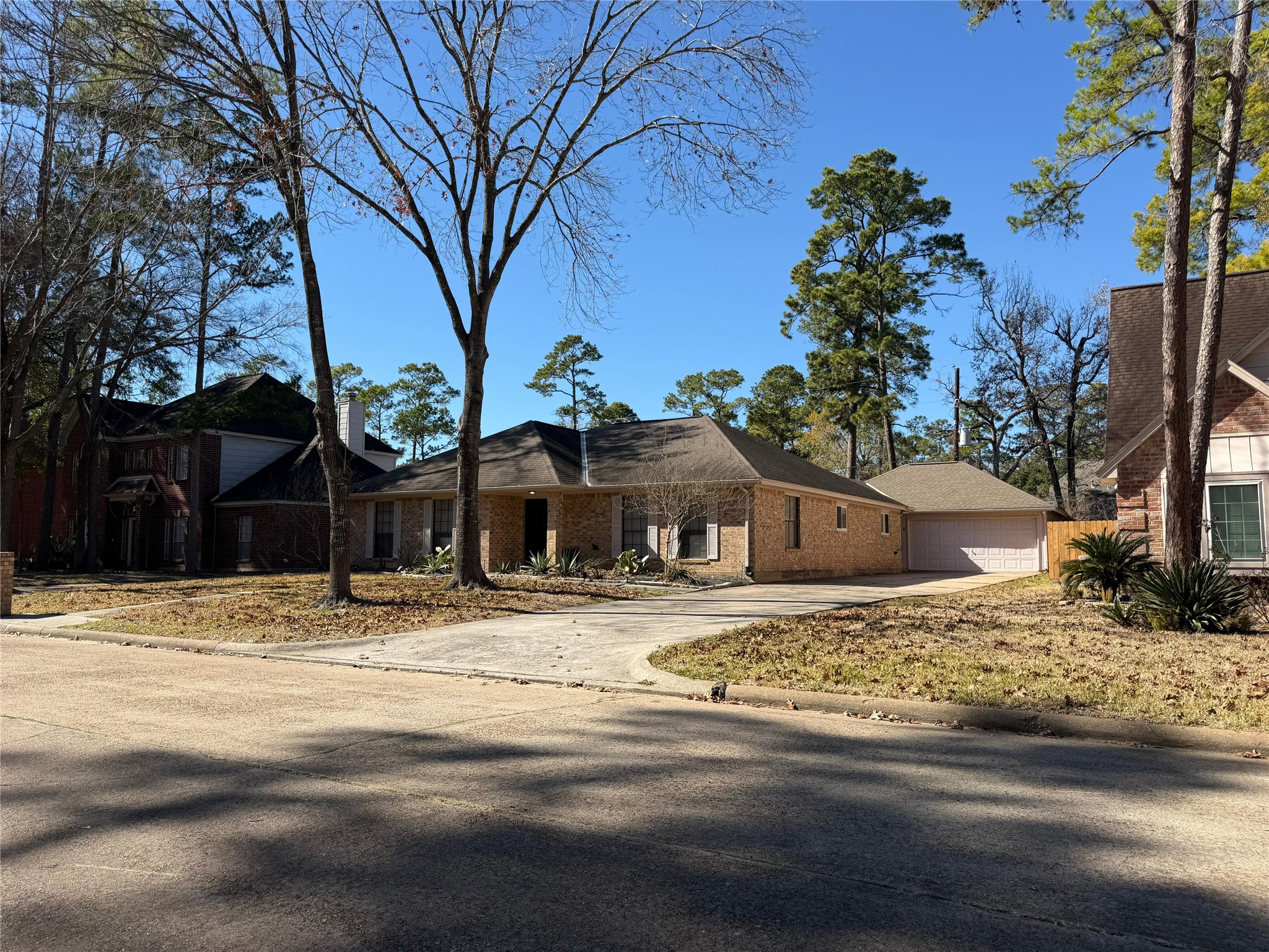 7818 King Arthur Court Spring, TX 77379 - Photo 4 of 29 a front view of a house with a yard