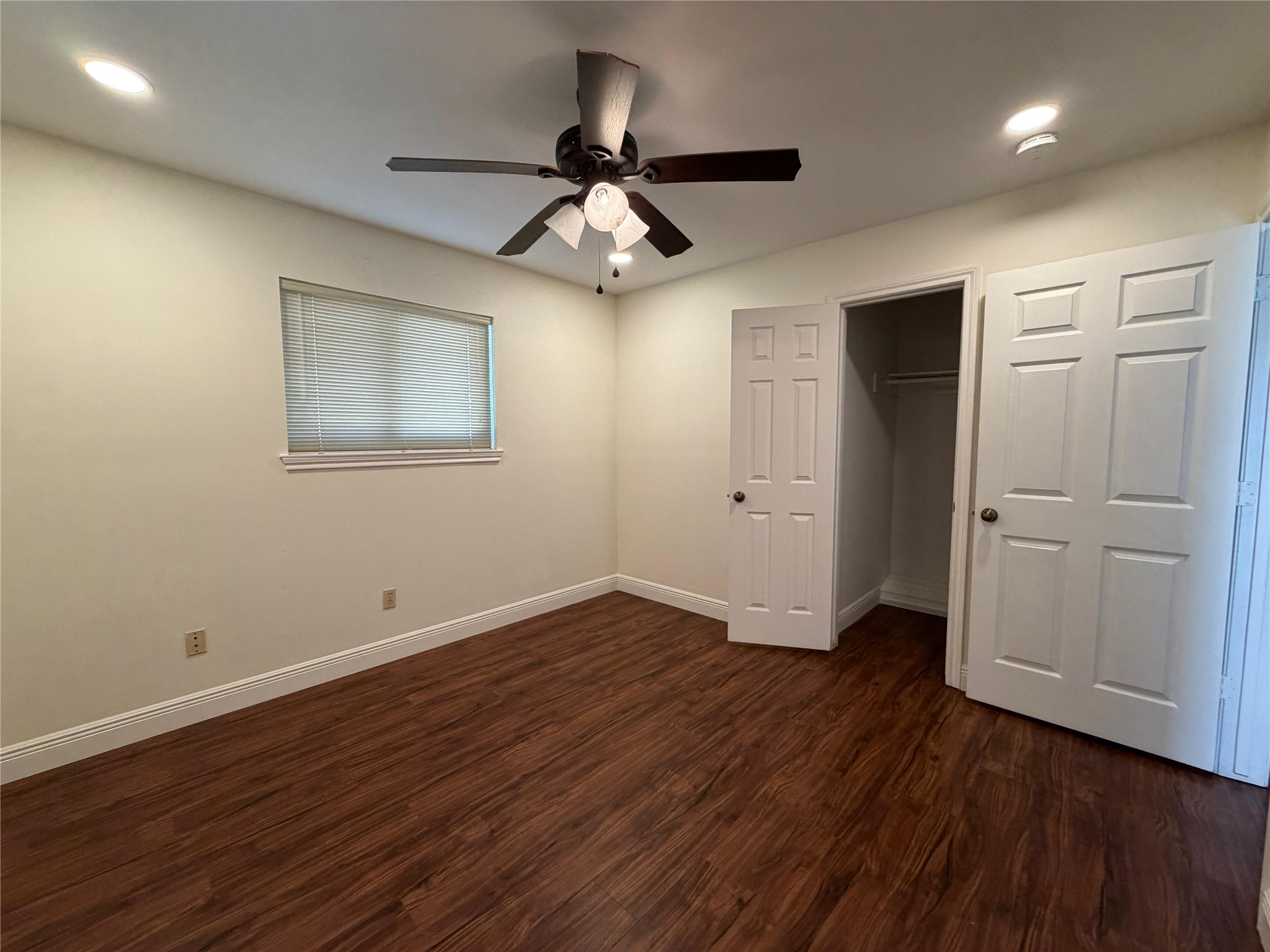 7818 King Arthur Court Spring, TX 77379 - Photo 5 of 29 a view of an empty room with wooden floor