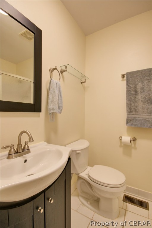 8757 Glass Road Hayes, VA 23072 - Photo 20 of 34 Updated hall bath with tile flooring.