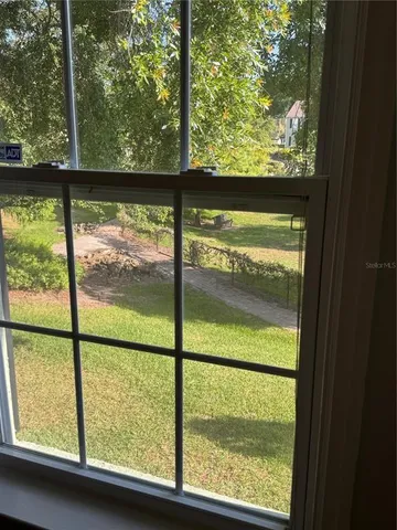 a view of a swimming pool with a sitting area