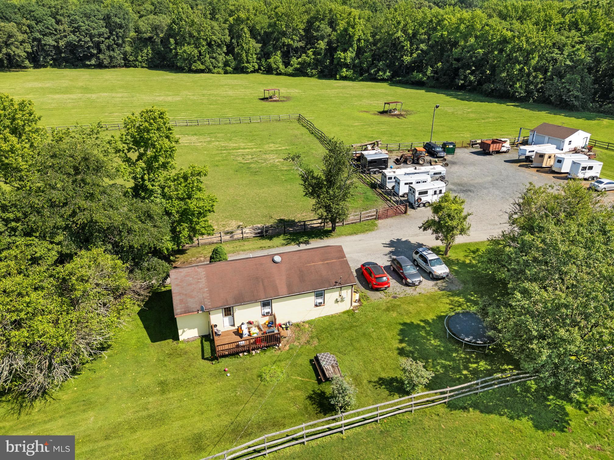 3613 Clayton Road Joppa, MD 21085 - Photo 15 of 27 an aerial view of a house with a garden and lake view