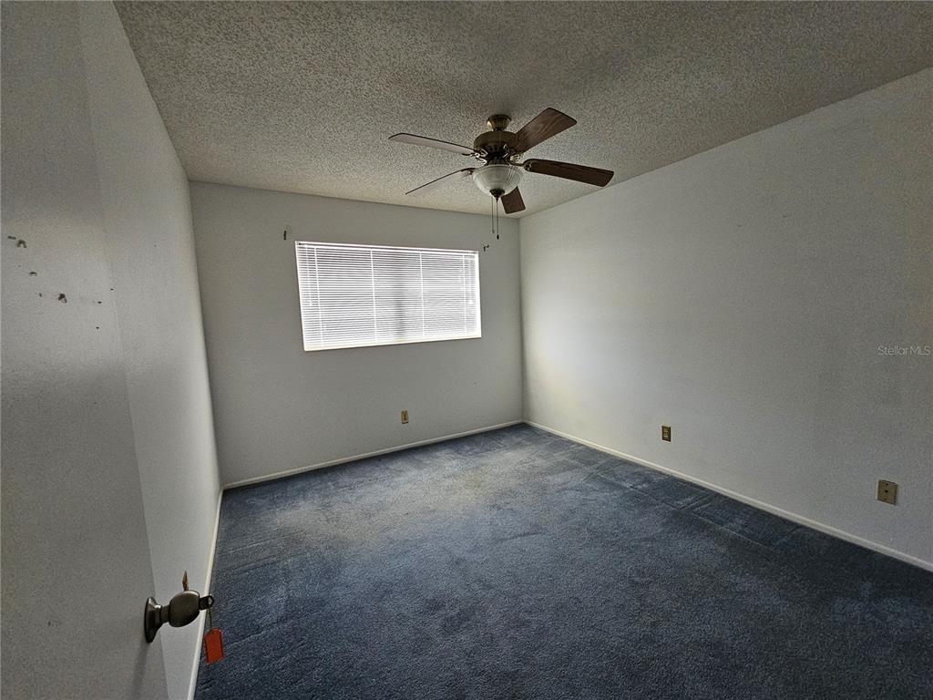 2386 Sumatran Way, Unit 44 Clearwater, FL 33763 - Photo 15 of 67 an empty room with a window
