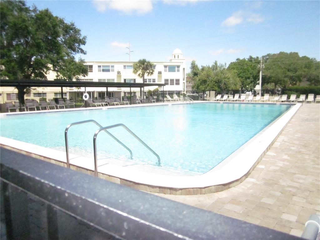 2386 Sumatran Way, Unit 44 Clearwater, FL 33763 - Photo 59 of 67 a view of a swimming pool with a lake