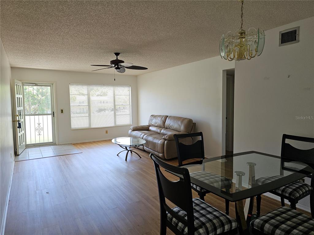 2386 Sumatran Way, Unit 44 Clearwater, FL 33763 - Photo 9 of 67 a living room with furniture and a window