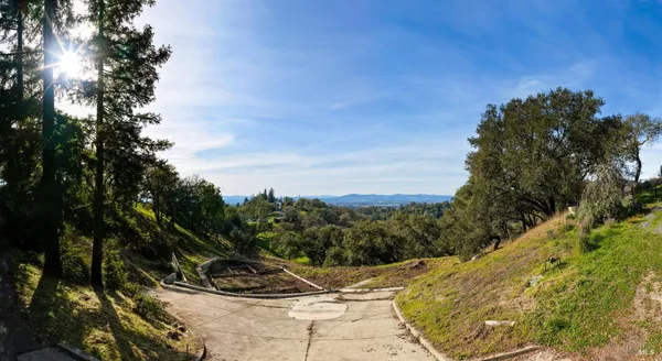 a view of a backyard of the house