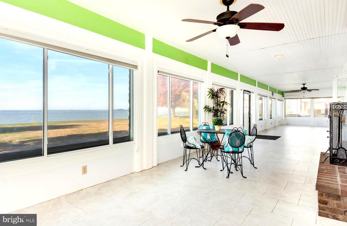3202 Bennett Point Road Queenstown, MD 21658 - Photo 11 of 49 Water View Sunroom Spanning Rear of Home