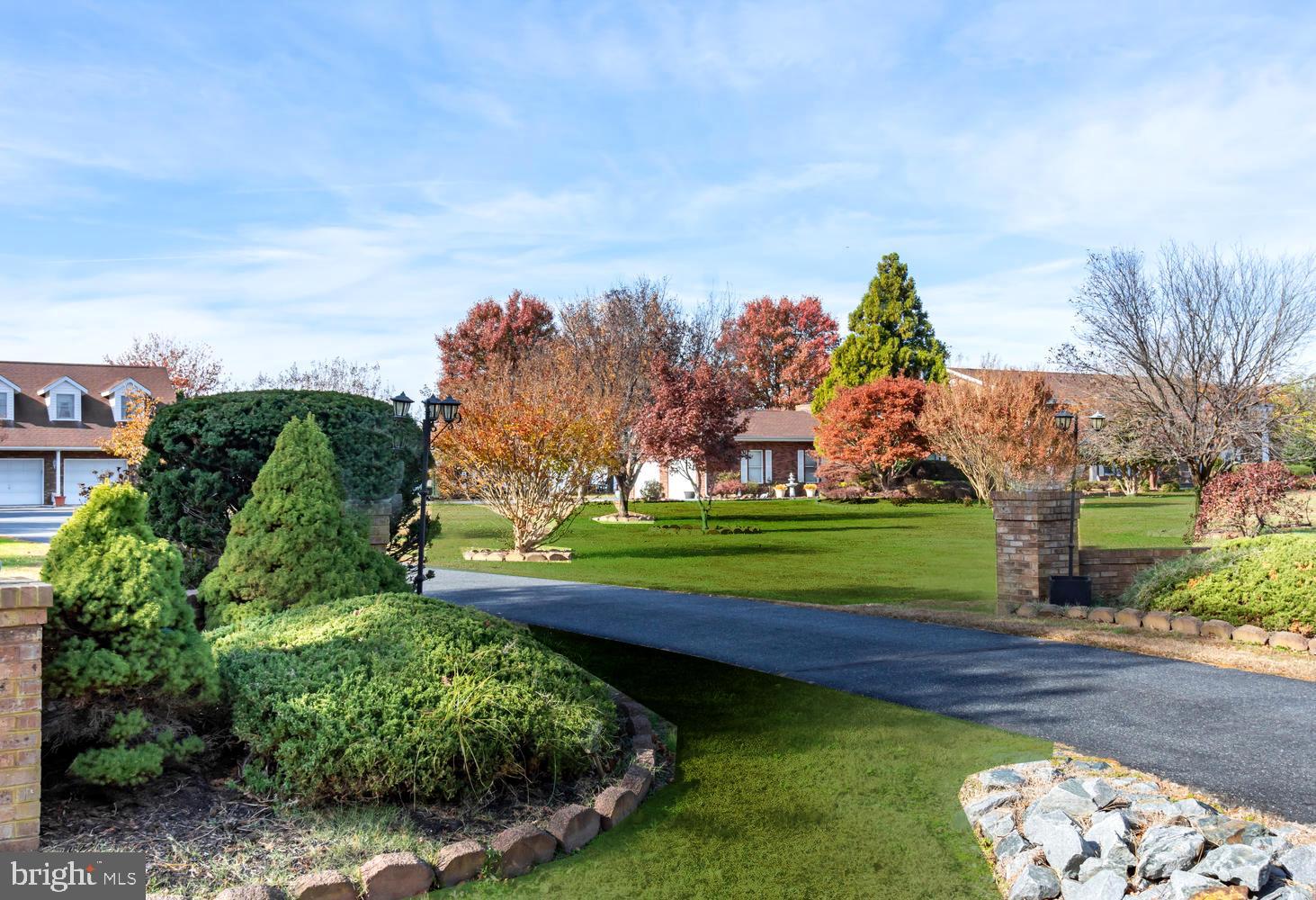 3202 Bennett Point Road Queenstown, MD 21658 - Photo 14 of 49 Stately Paved Entry . Professional Landscaping