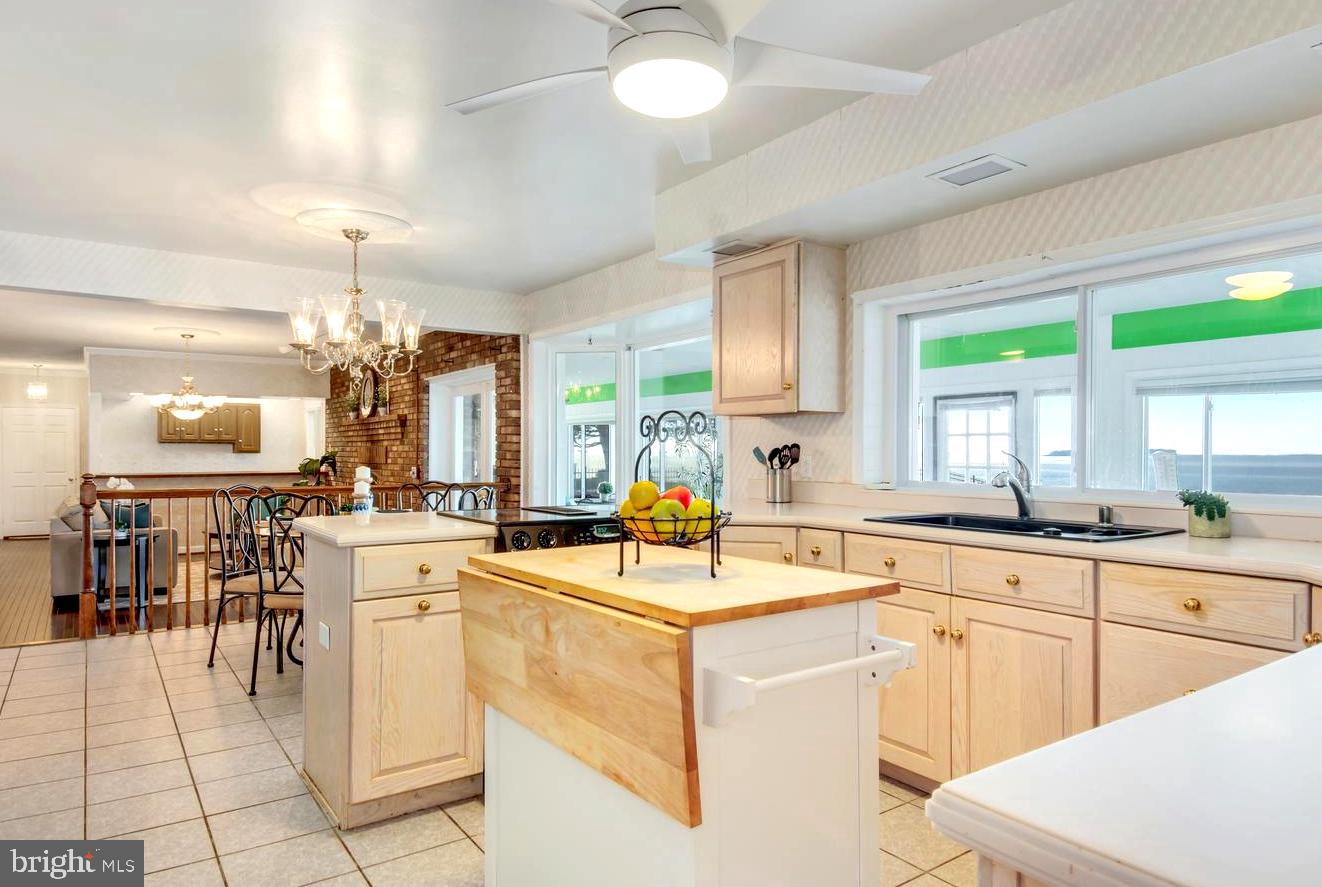 3202 Bennett Point Road Queenstown, MD 21658 - Photo 21 of 49 Remodeled Kitchen . Custom Cabinetry & Prep Island