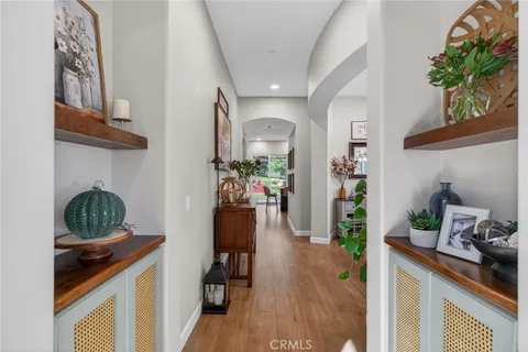 a large kitchen with a table and chairs