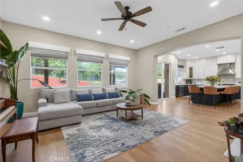 a white bath tub sitting next to a shower