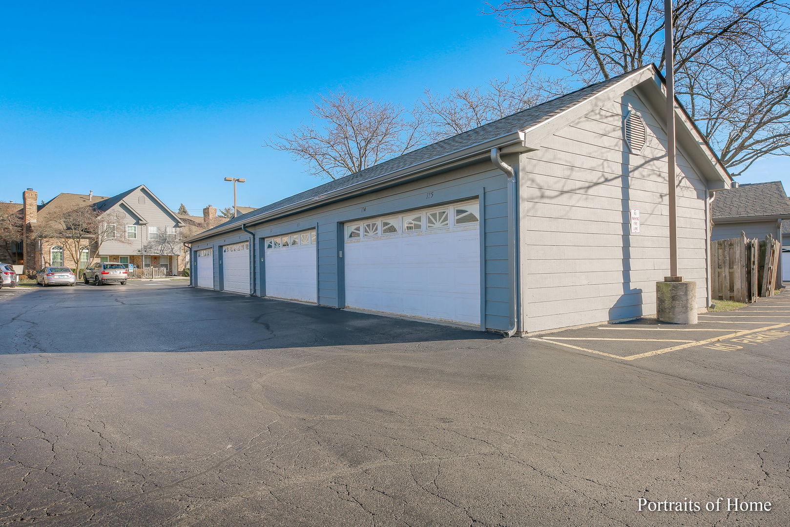 23 Foxcroft Road, Unit 115 Naperville, IL 60565 - Photo 16 of 19 a view of the house with a road