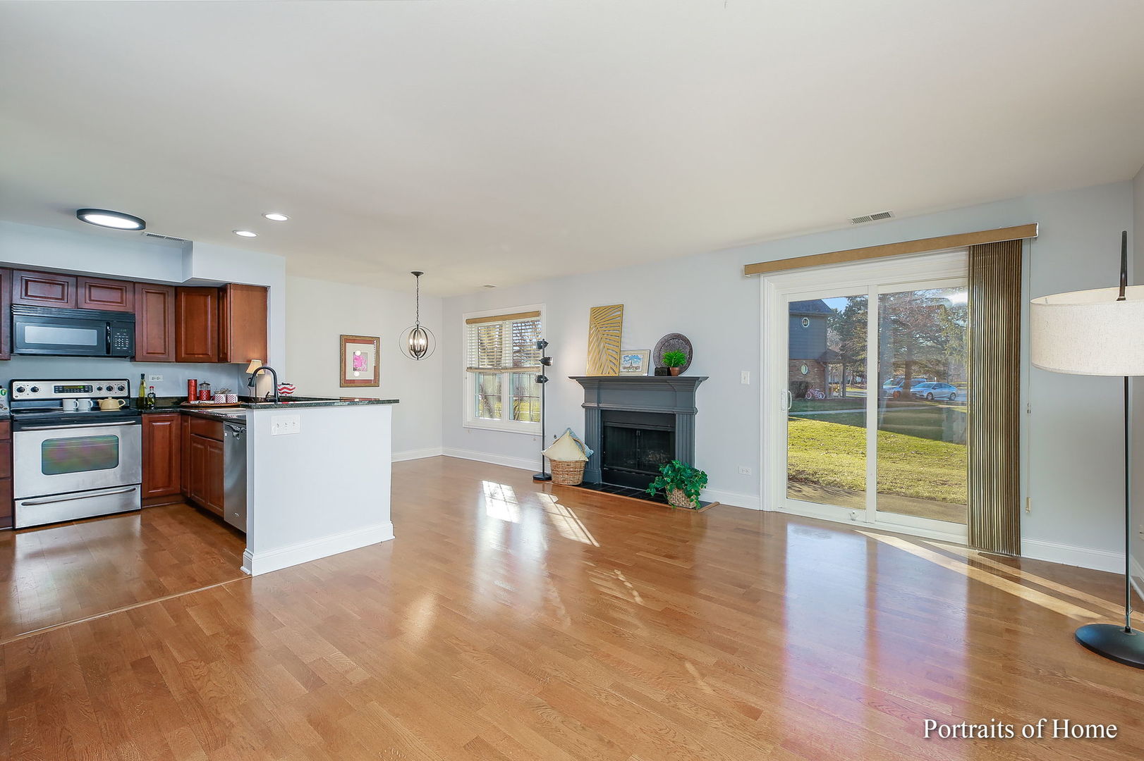 23 Foxcroft Road, Unit 115 Naperville, IL 60565 - Photo 4 of 19 a kitchen with sink and refrigerator