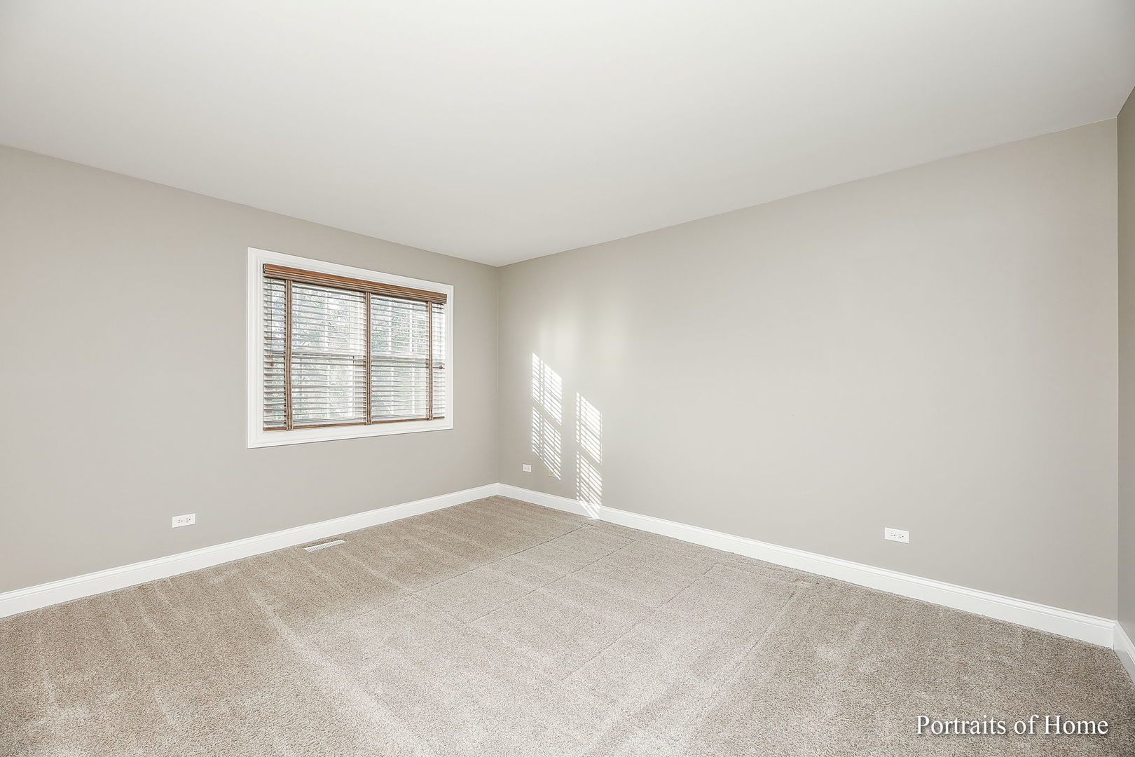23 Foxcroft Road, Unit 115 Naperville, IL 60565 - Photo 10 of 19 an empty room with windows
