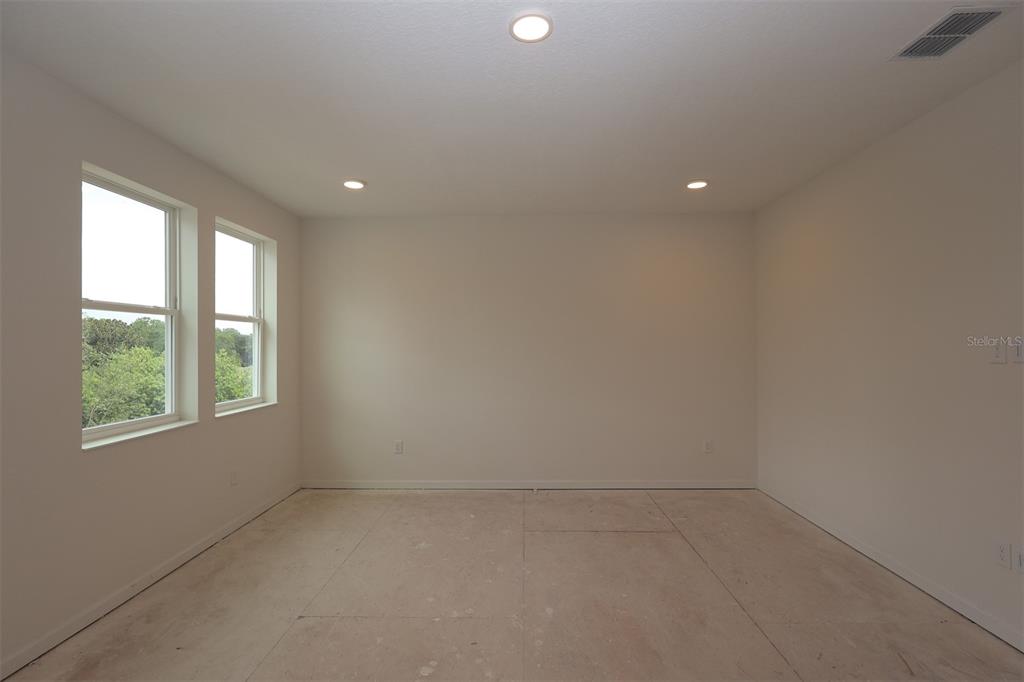 5426 Park Guell Street St. Cloud, FL 34771 - Photo 11 of 64 an empty room with a window