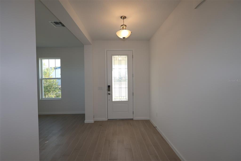 5426 Park Guell Street St. Cloud, FL 34771 - Photo 24 of 64 an empty room that has a window