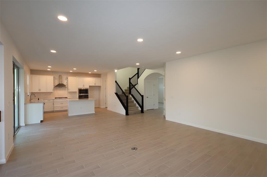 5426 Park Guell Street St. Cloud, FL 34771 - Photo 38 of 64 a view of a living room and kitchen