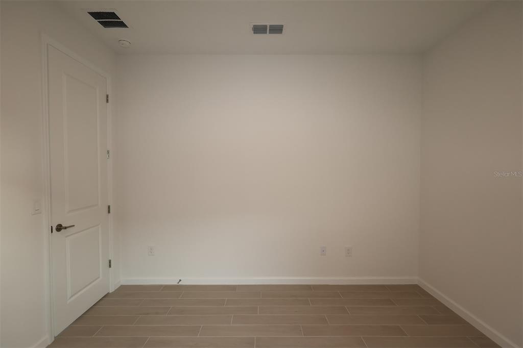 5426 Park Guell Street St. Cloud, FL 34771 - Photo 44 of 64 a view of an empty room