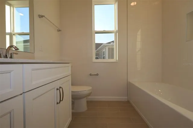 a view of a house with a garden