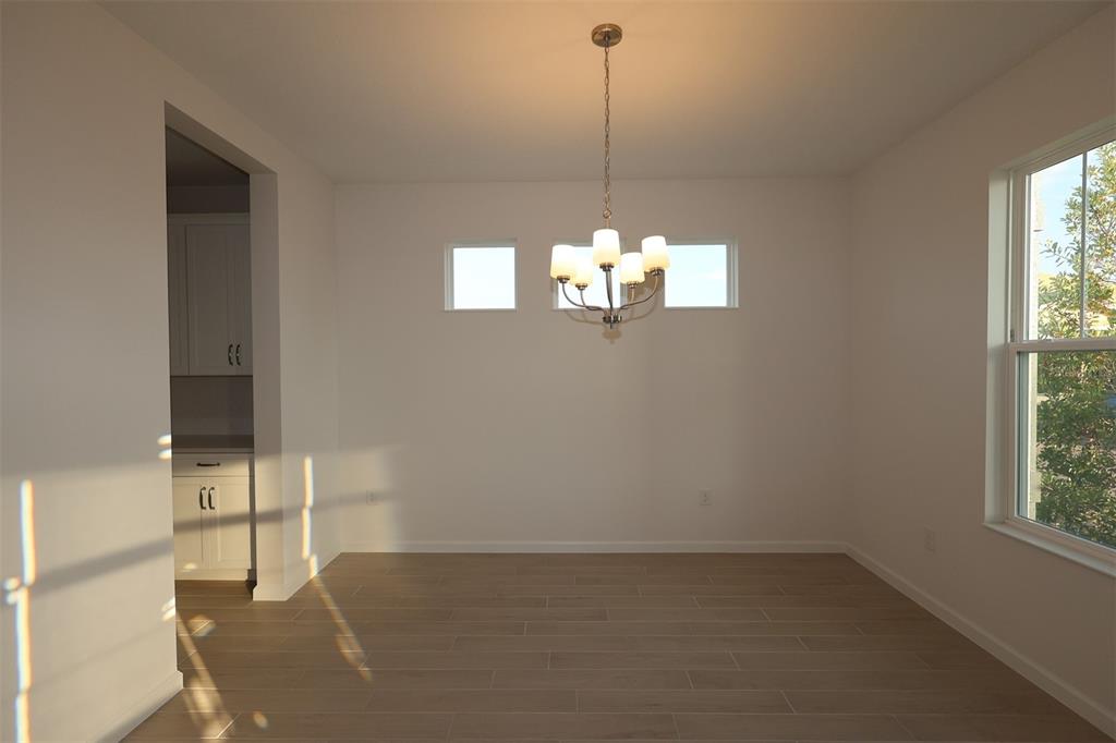 5426 Park Guell Street St. Cloud, FL 34771 - Photo 56 of 64 a view of a room with a window