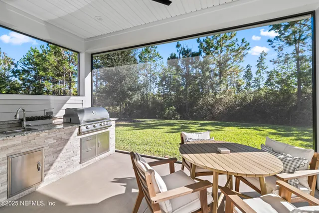a view of a swimming pool with a yard