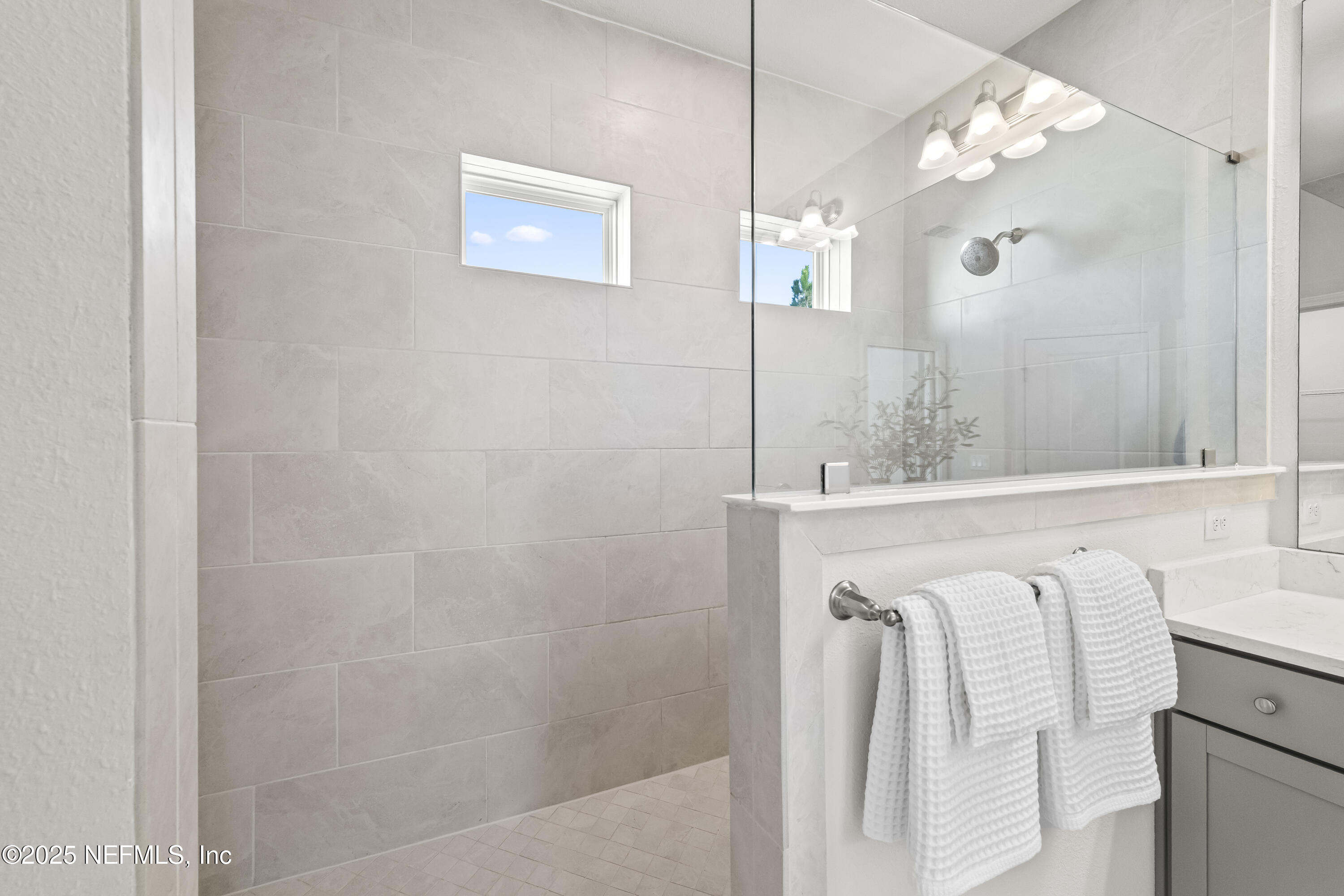 10459 Innovation Way Jacksonville, FL 32256 - Photo 33 of 54 a bathroom with a bathtub and a sink