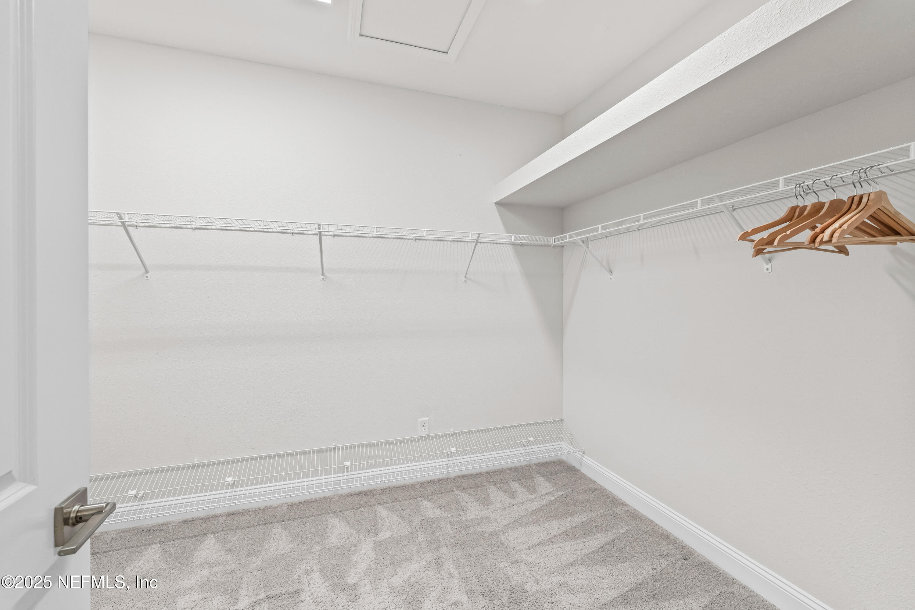 10459 Innovation Way Jacksonville, FL 32256 - Photo 36 of 54 a view of a room with racks on the wall