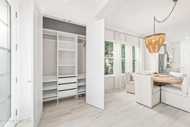 a view of living room with furniture and window