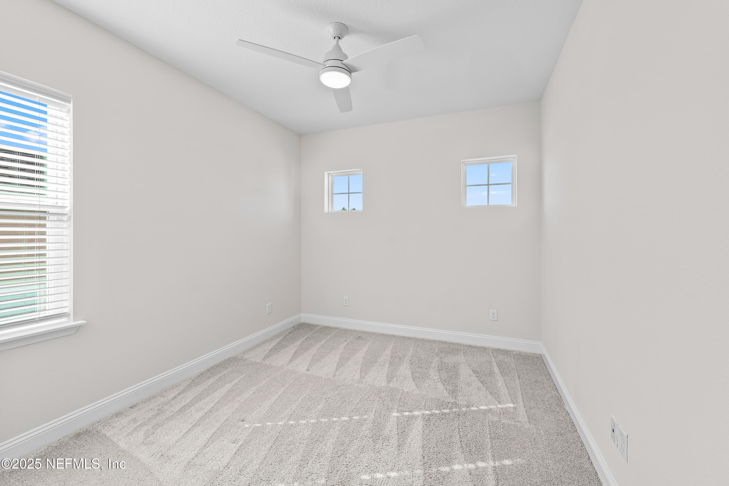 10459 Innovation Way Jacksonville, FL 32256 - Photo 42 of 54 an empty room with a window
