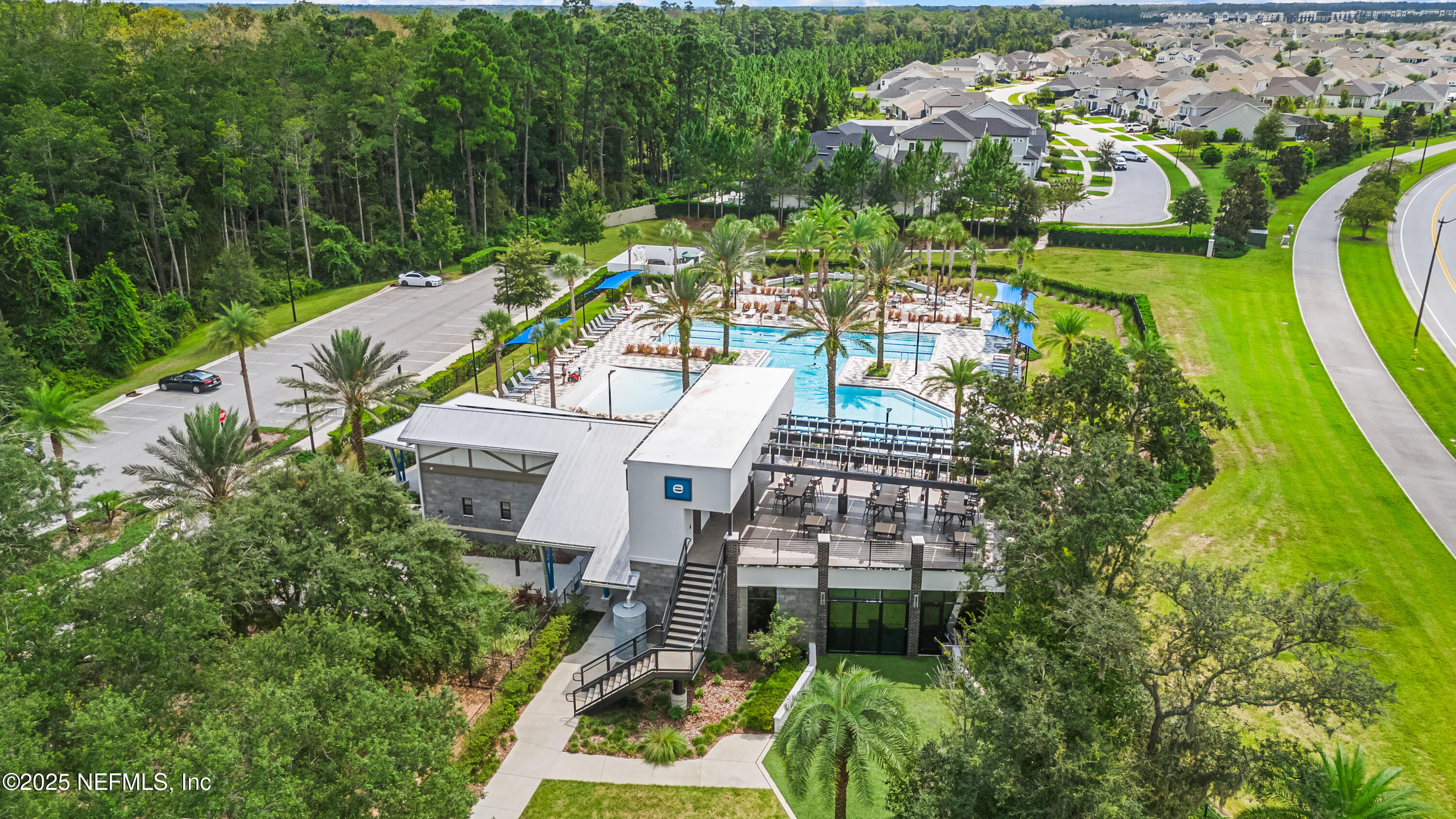 10459 Innovation Way Jacksonville, FL 32256 - Photo 43 of 54 a view of a multi story building with a yard